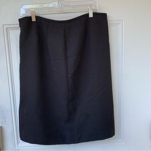 Black Pinstripe Straight Skirt. Size 14. Zipper closure on side. Split i…